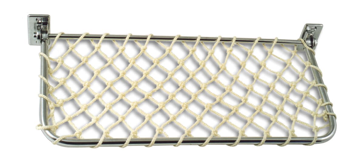 Tilting rack for magazines with stop spring